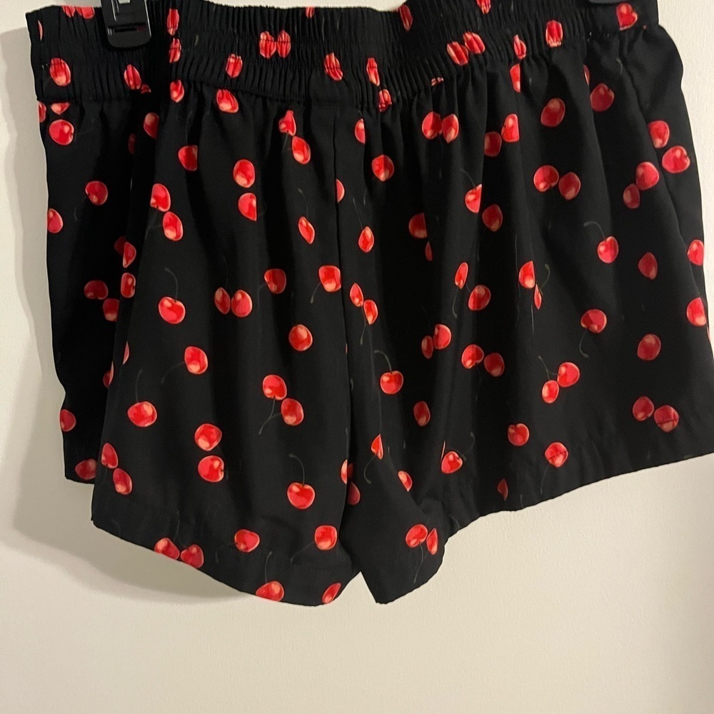 Black Shorts with Red Cherry Print Shorts are 11in long. 27in waist - Picture 3 of 3